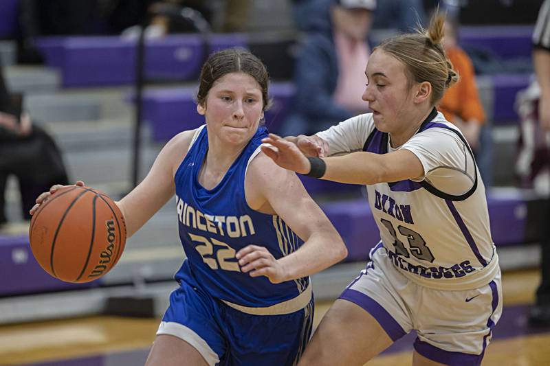 Princeton’s Camryn Driscoll handles the ball against Dixon’s Bailey Tegeler Thursday, Jan. 4, 2024 at Dixon High School.