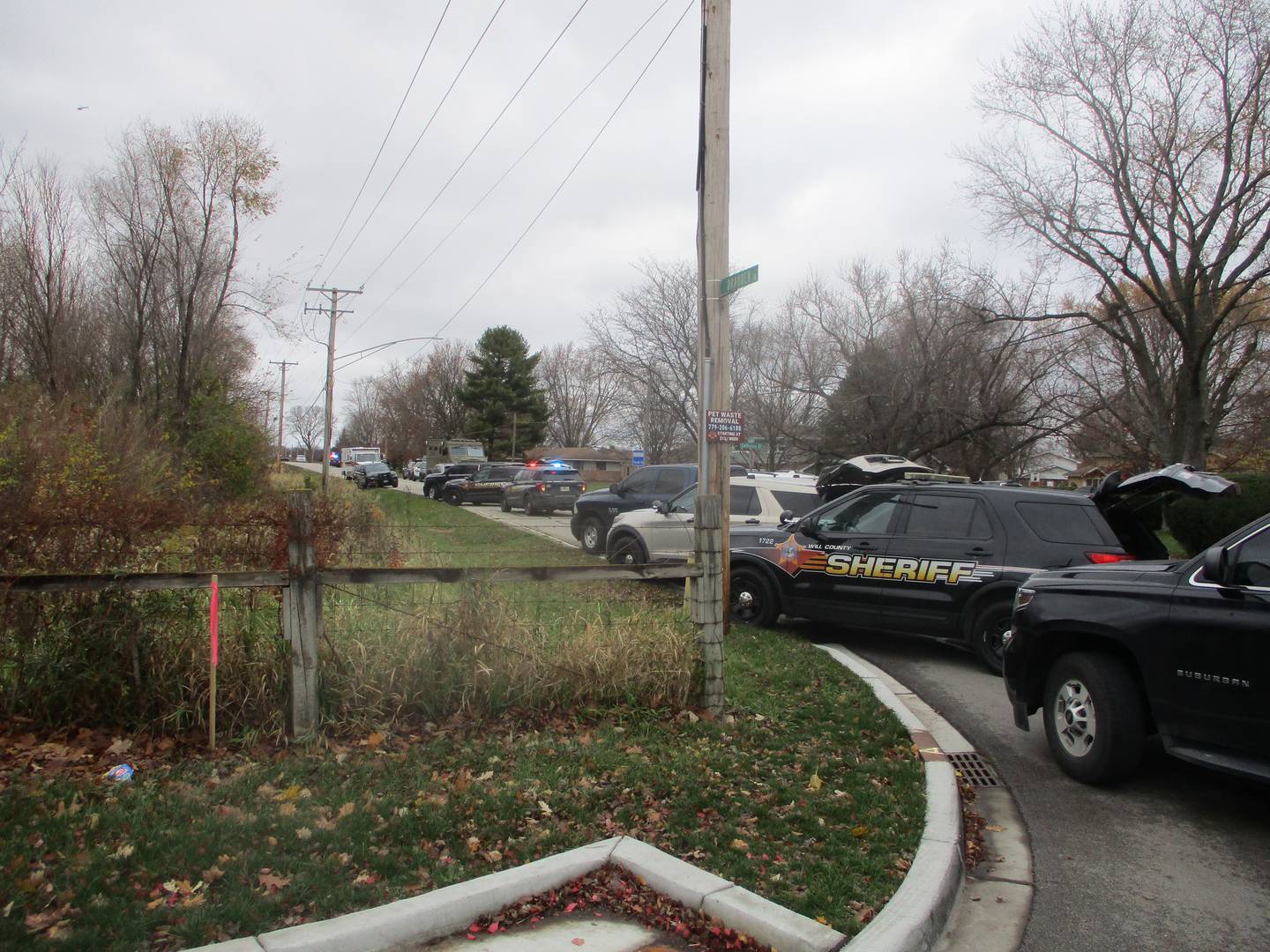 Marked and unmarked police vehicles filled a section of Drauden Road near Dina Court as police on Friday morning dealth with a barricade situation in which one woman was injured. Nov. 22, 2024