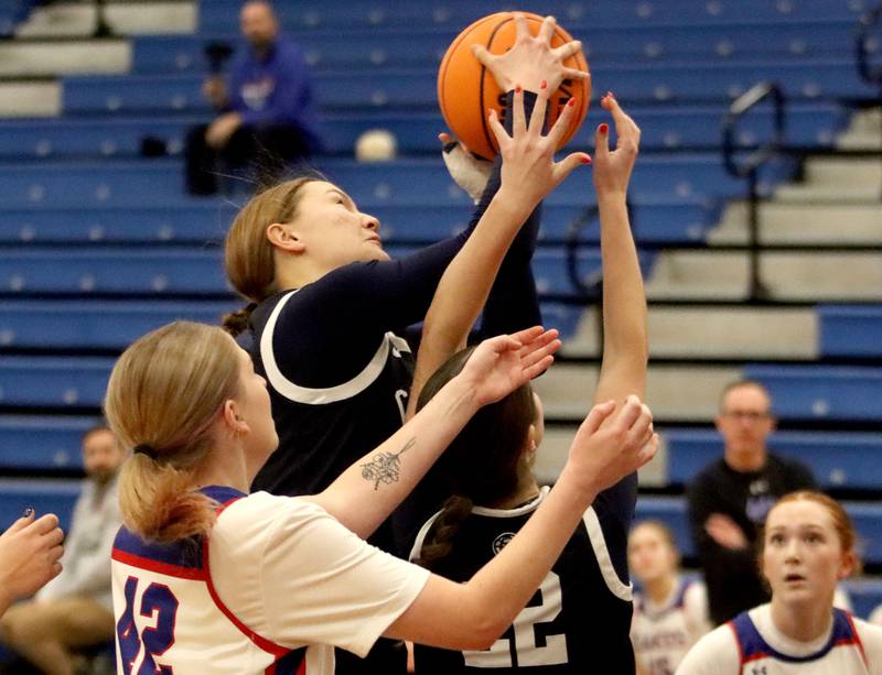 Cary-Grove’s Aria Stanton snags a rebound against Lakes  in varsity girls basketball action on Friday, Jan. 2, 2026  at Lakes High School in Lake Villa.