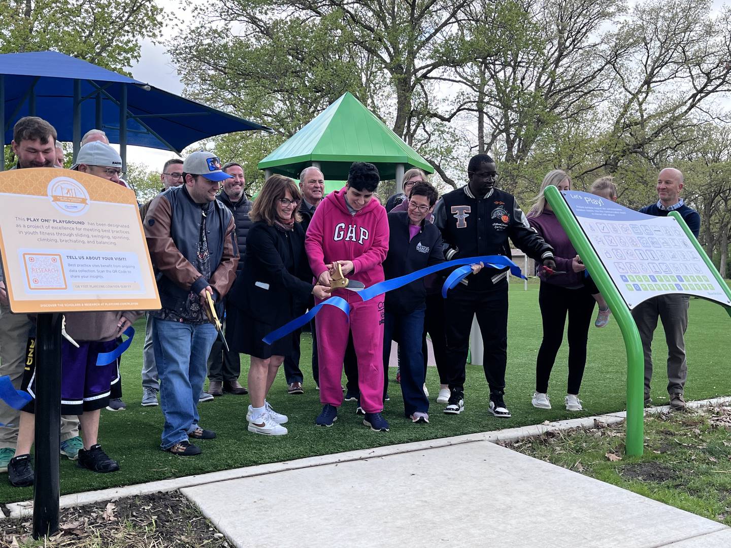 Elected officials and participants in the Special Recreation of Joliet and Channahon hold a ribbon-cutting ceremony for Inwood Park on Friday, May 1, 2026, in Joliet. The park has received national recognition for its inclusive and accessible design and features.