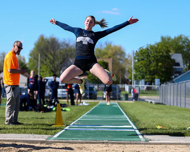 Oswego East's Faith Adams competes in the long jump at the  Girls Track, Southwest Prairie Conference meet.  May 3, 2023.