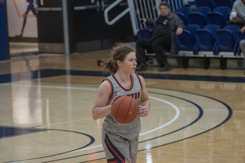Morton College freshman and former Wheaton North star Claire Hyde dribbles the ball up the court during a game this season.