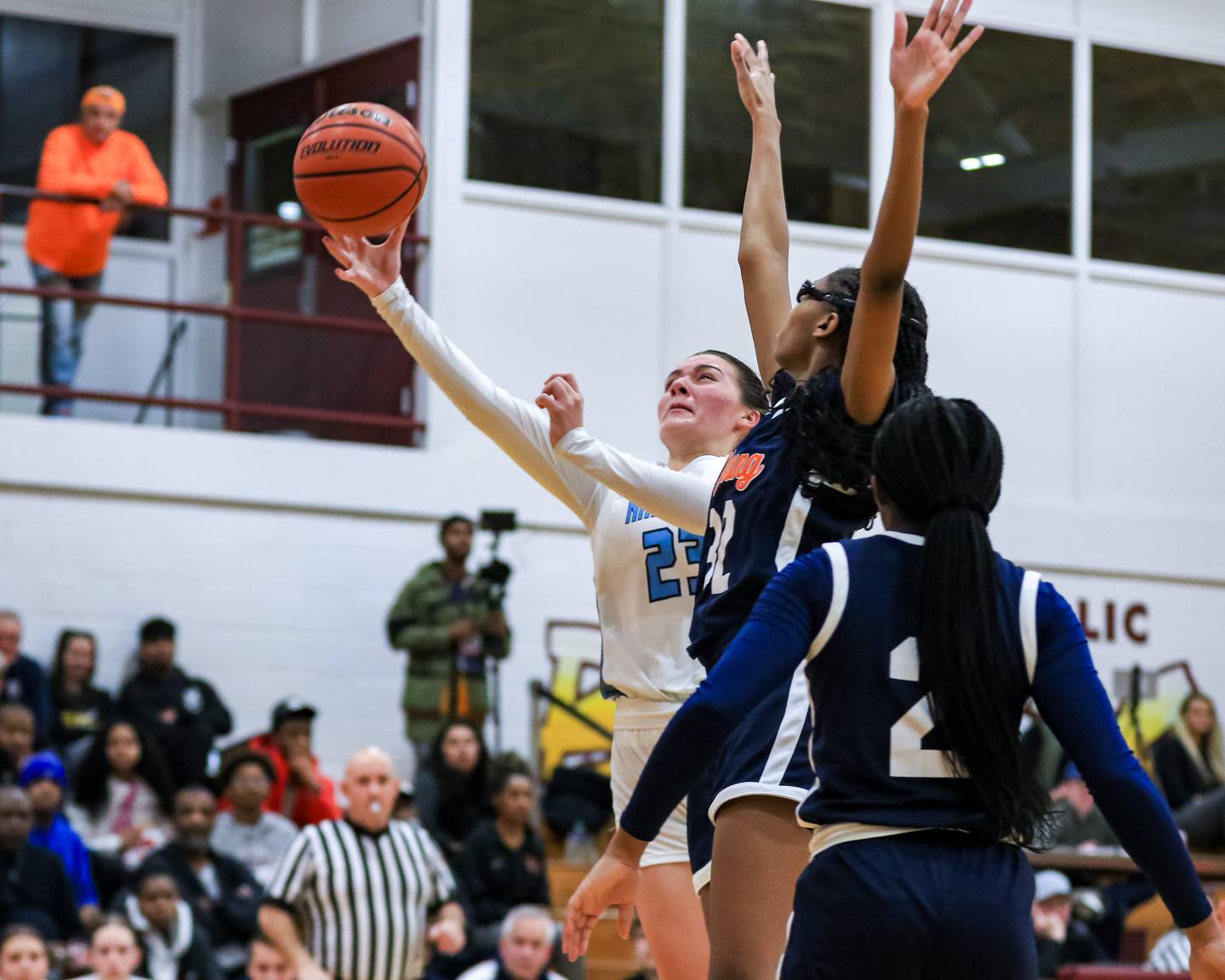 Nazareth's Danni Scully (23) puts up a contested shot during the Montini Christmas Classic, championship basketball game between Nazareth vs Young.  Dec 30, 2022.