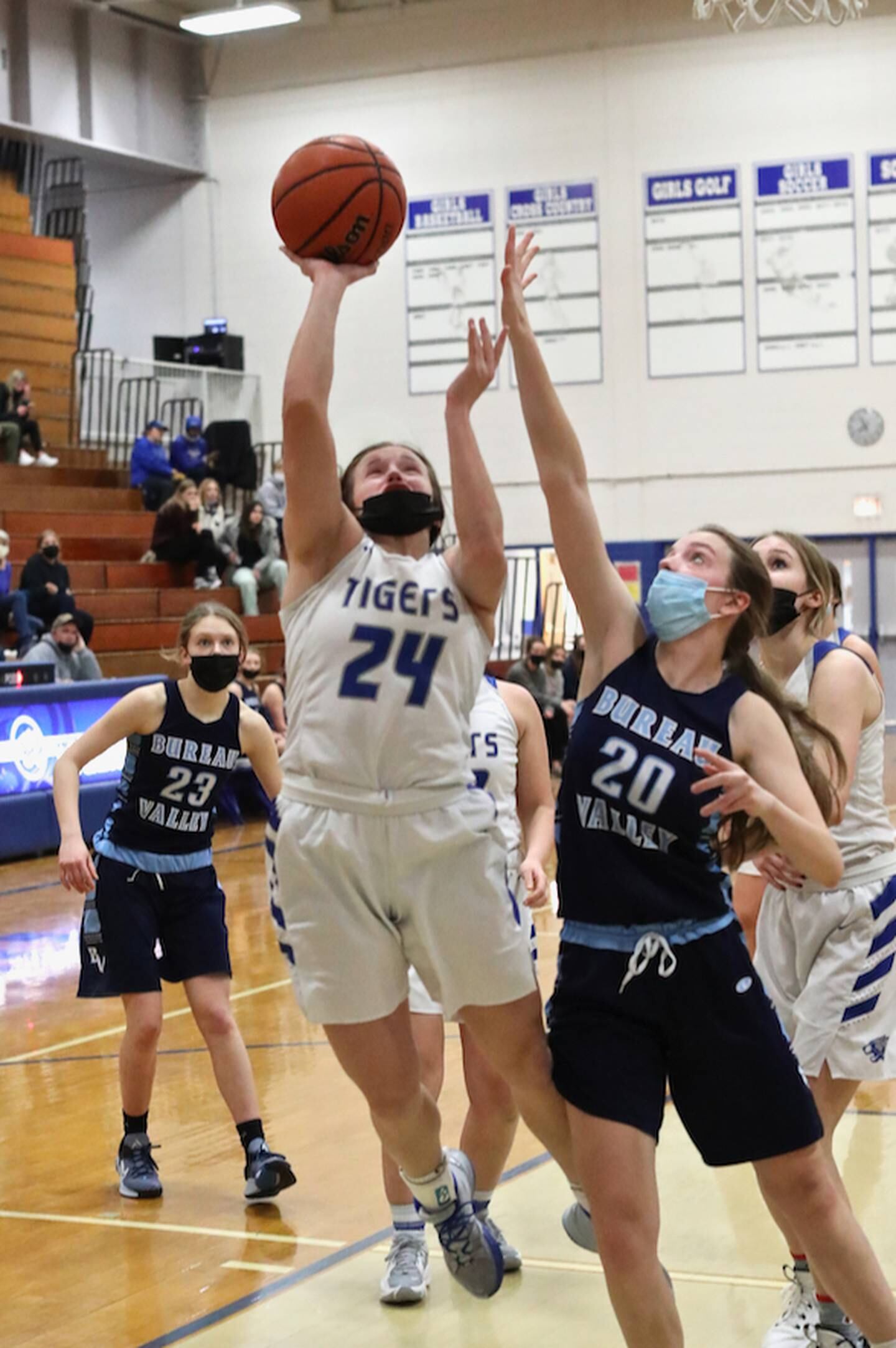 Princeton's McKenzie Hecht shoots over Bureau Valley's Jennifer Etheridge Monday night at Prouty Gym. The Tigresses won 54-17.