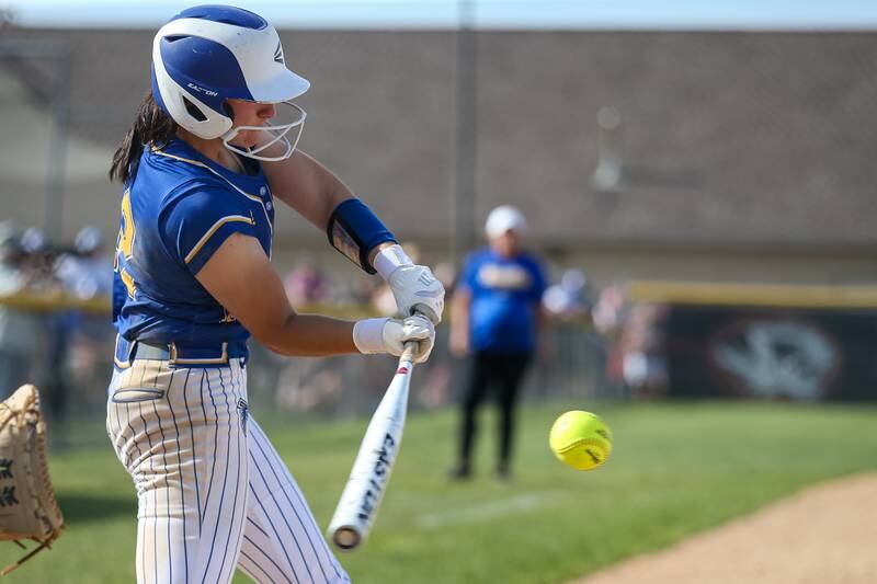 Wheaton North's Macy Pomatto (12) swings away during Class 4A Plainfield North Sectional final softball game between Wheaton North at Oswego. May 31th, 2024.