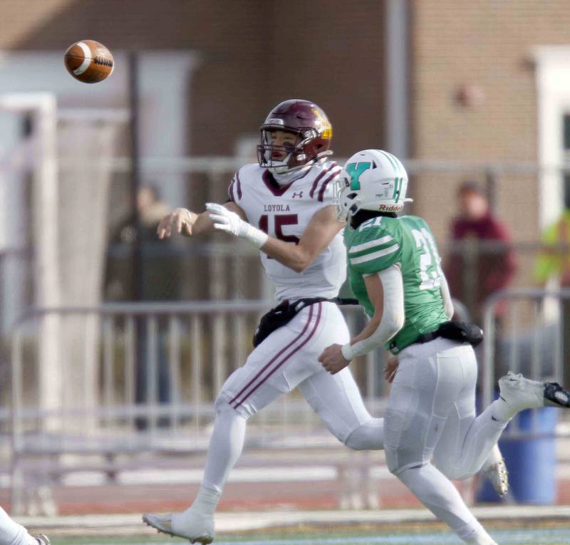 Loyola's Jake Stearney (15) throws on the run during the IHSA Class 8A semifinal football game Saturday November 19, 2022 in Elmhurst.