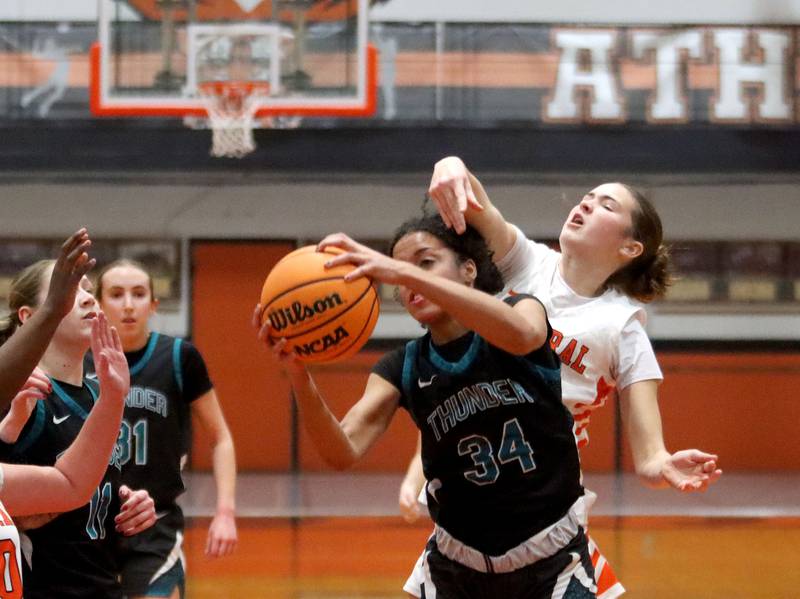 Crystal Lake Central’s Avery Watson, back, guards Woodstock North’s Jaida Collins in varsity girls basketball on Monday, Jan. 26, 2026, at Crystal Lake Central High School in Crystal Lake.
