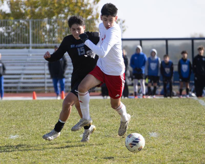 St. Charles North's Wicho DelaPaz battles for the ball with South Elgin's Chris Aguilar at the Class 3A Sectional Final on Saturday, Nov. 1,2025 in South Elgin.