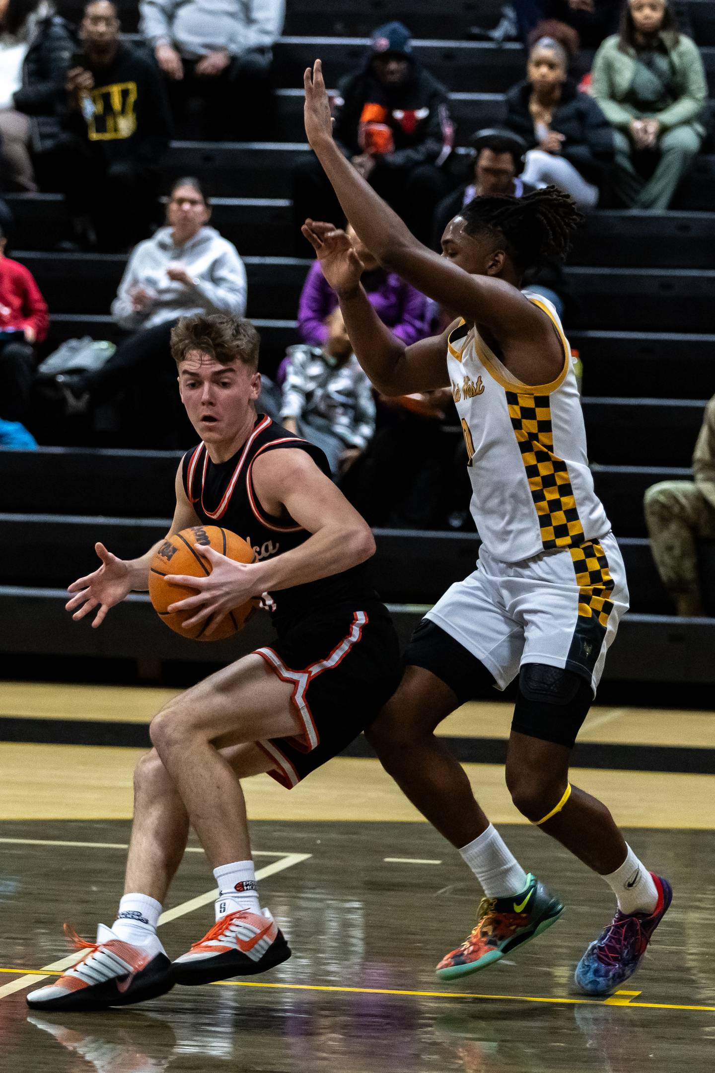 Minooka's Brady Hairald tries to shake the defense during a varsity boys basketball game against Joliet West at Joliet West on Jan. 6, 2026.