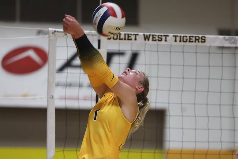 Joliet West’s Ava Grevengoed keeps the volley alive against Plainfield North on Wednesday, Sept. 6, 2023 in Joliet.