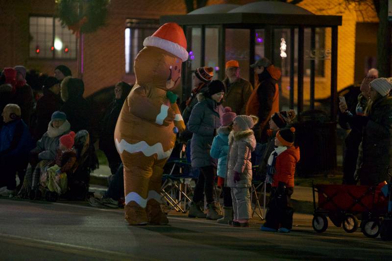 Gingerbread visits parade goers at the Frosty & Friends Parade at the Holly Days Winter Festival on Saturday, Dec. 3,2022 in Westmont.
