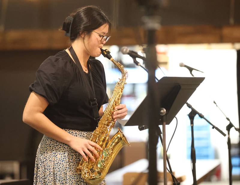 Zulee Moreland, a senior at Ottawa Township High School, plays the saxophone during the 9th annual NCI Artworks Mad Hatter Ball on Friday, Jan. 16, 2026 at the Westclox Event Center in Peru. Moreland, performs with school, municipal and summer jazz bands. Moreland is interested in music education later in life.