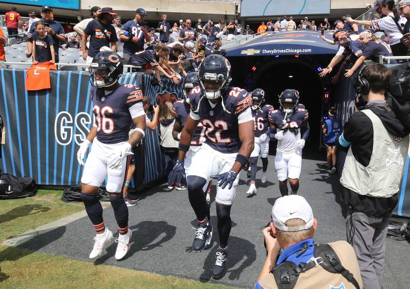 The Chicago Bears take the field for warmups before they meet the Cincinnati Bengals Saturday, Aug. 17, 2024, at Soldier Field in Chicago.