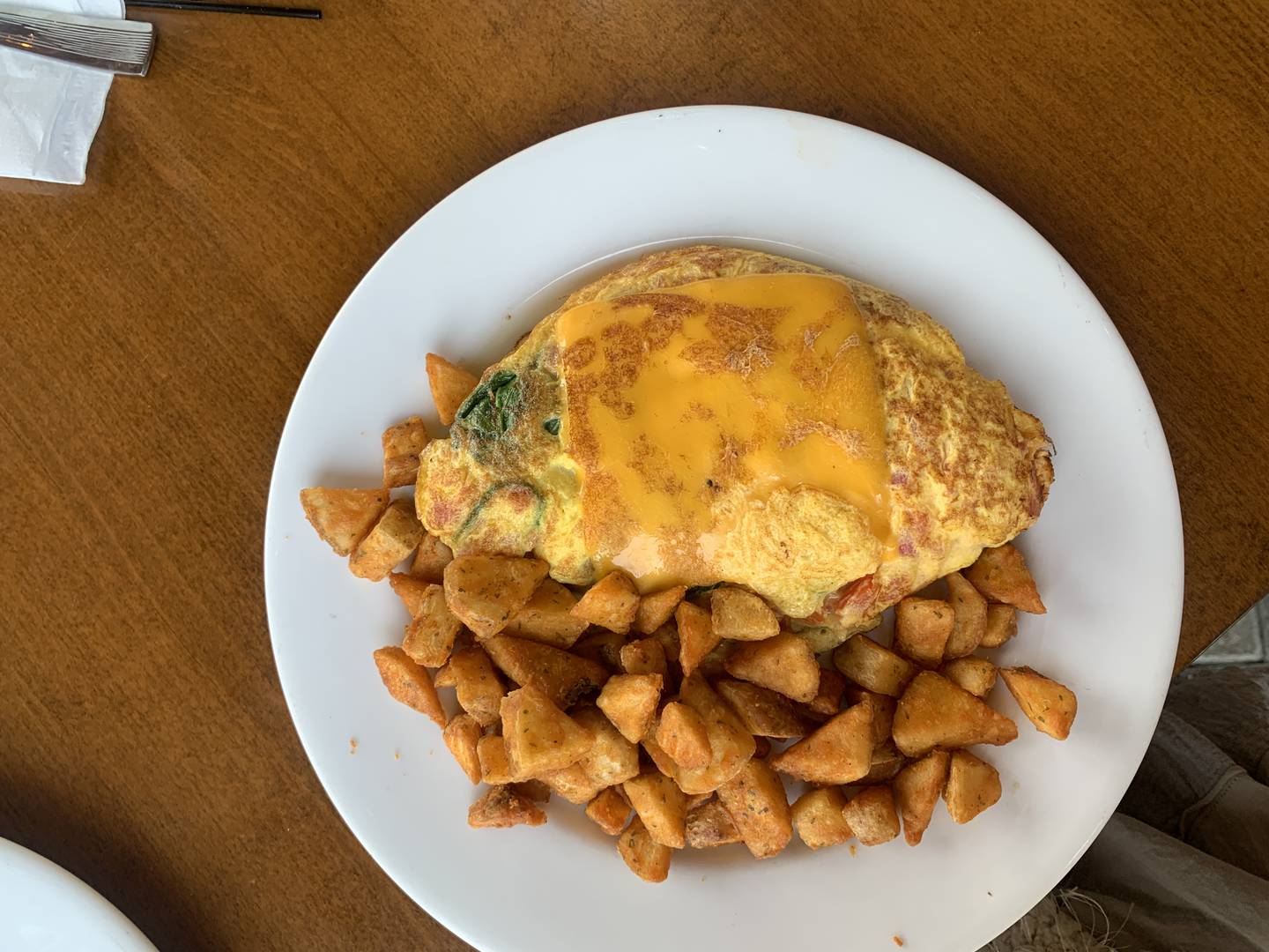 Maple and Hash B.Y.O.O Build Your Own Omelette  ($13) for a choice of two ingredients with a side of potatoes. Each additional ingredient in the omelette is $1 each. Comes with a choice of toast, English muffin, biscuit, or an upgrade of a specialty pancake for an additional $3.