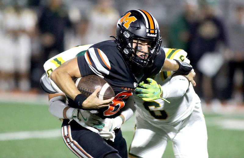 McHenry’s Jeffry Schwab runs the ball against Crystal Lake South in varsity boys football at McCracken Field on the campus of McHenry High School in McHenry on Friday, Sept. 5, 2025.