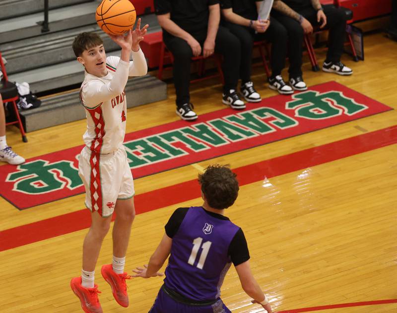 L-P's John Sowers drains a three-point basket over Dixon's Brody Nicklaus during the Class 3A Regional semifinal game on Wednesday, Feb. 25, 2026 in Sellett Gymnasium at L-P High School.