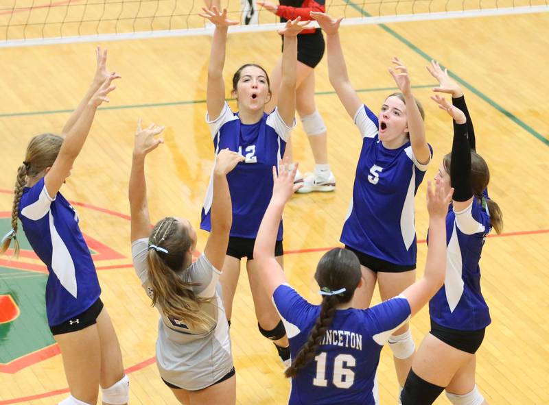 Members of the Princeton react after scoring a point against L-P on Tuesday, Aug. 22, 2023 in Sellett Gymnasium.