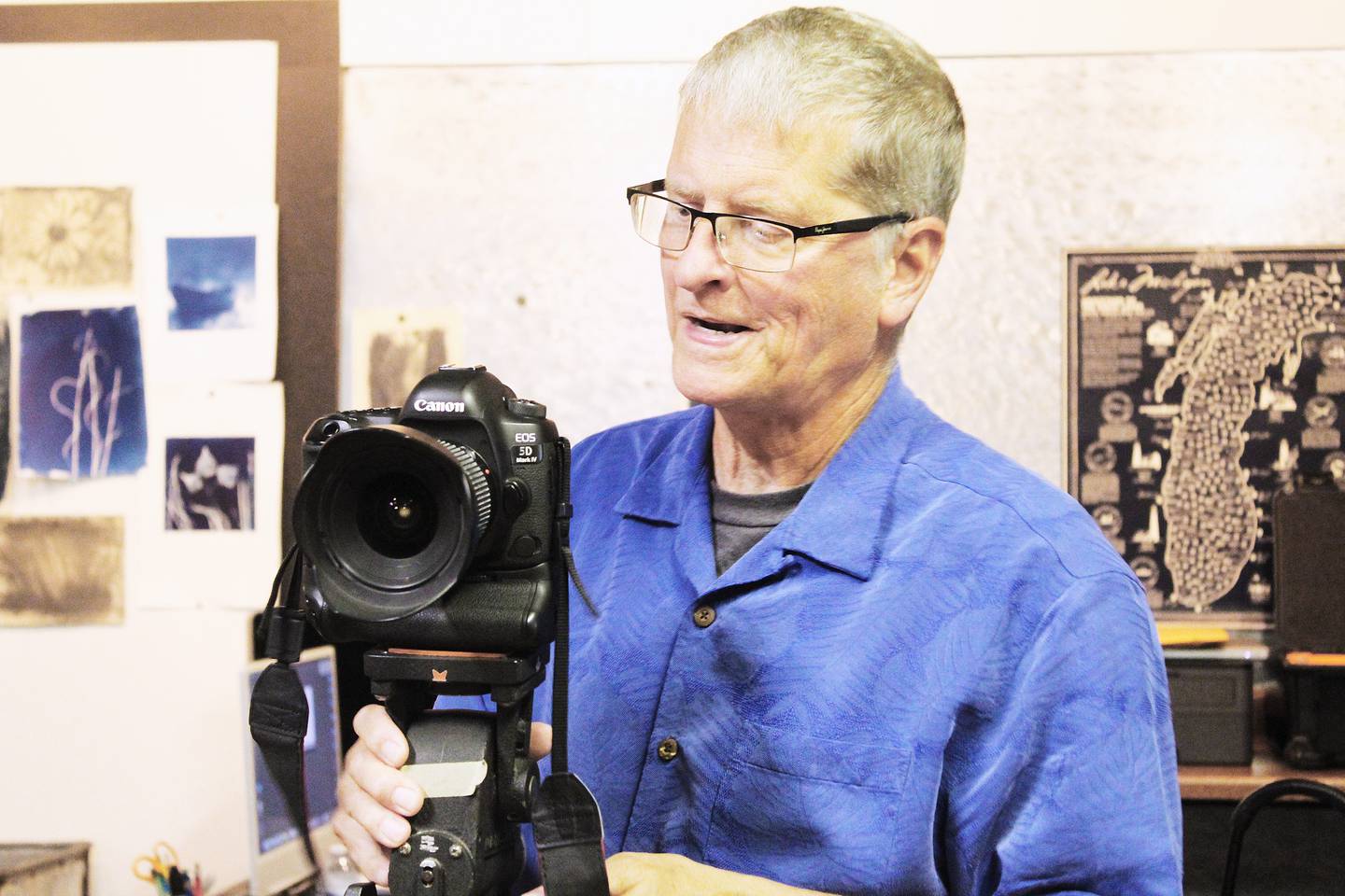 Steve Sullivan of Erie shows off his Canon EOS 5D Mark IV, his primary camera he takes with him on commercial photography assignments.