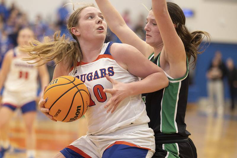 Eastland’s Izzy Ames works against Wethersfield’s Camryn Anderson Tuesday, Feb. 24, 2026, in the Class 1A sectional at Eastland High School.