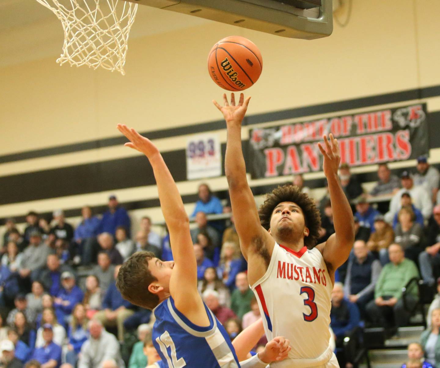 Morrison's DaeShaun McQueen lets go of a shot over Princeton's Tyson Phillips during the Class 2A Regional final game on Friday, Feb. 23, 2024 at Erie-Prophetstown High School.