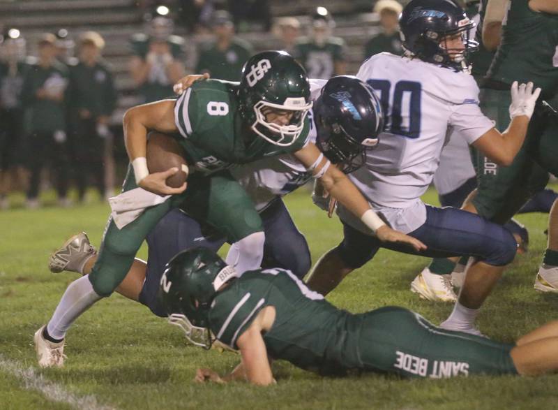 St. Bede quarterback Gino Ferrari gets a few extra yards while playing Bureau Valley on Friday Aug. 29, 2025 at St. Bede Academy.
