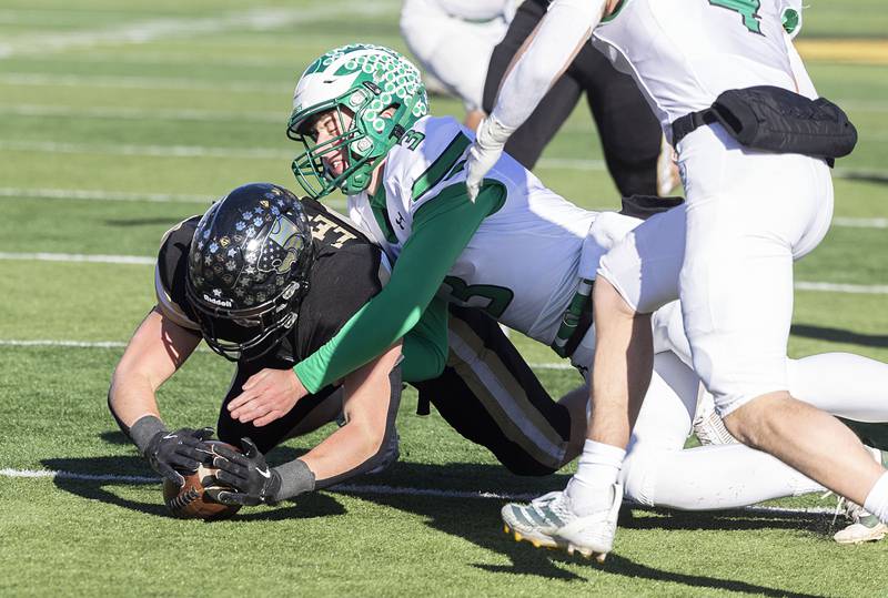 Lena-Winslow's Jaden Schubert dives on a blocked punt against Brown County Friday, Nov. 28, 2025, in the Class 1A football finals at Hancock Stadium at ISU.