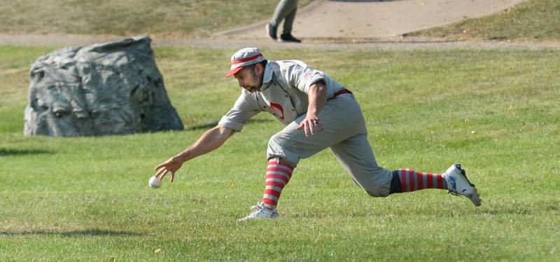 Oregon Ganymede first baseman Tim Strohecker reaches for a ground ball against the Lah-De-Dahs at the World Tournament of Historic Base Ball held at the Henry Ford Museum's Greenfield Village on Sunday. Aug. 10, 2025.