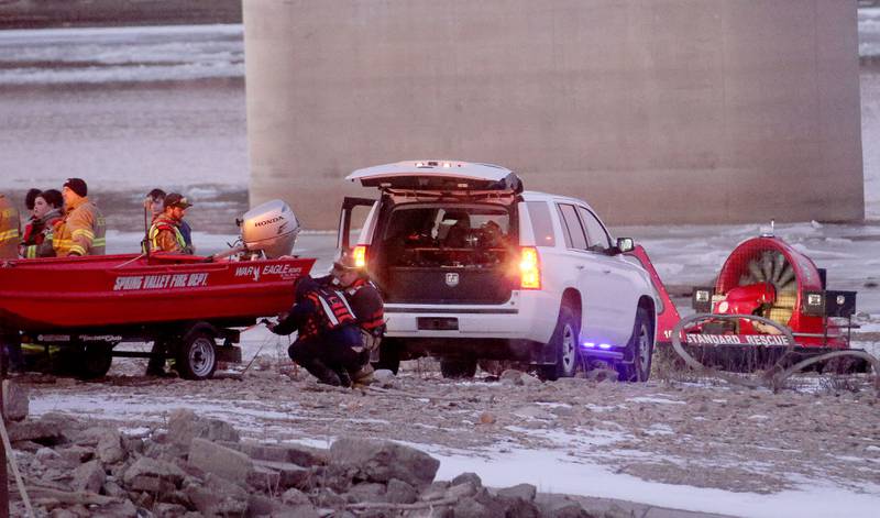 Spring Valley and Standard firefighters work the scene of a water rescue along the boat ramp on Thursday, Jan. 16, 2025 at the Spring Valley Boat Club in Spring Valley.