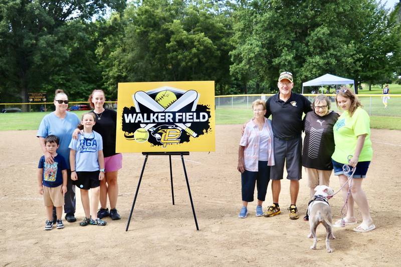 Chris Walker was joined by family members for Saturday's field dedication in his honor at PCJH.
