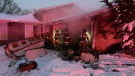 Joliet firefighters put out garage fire