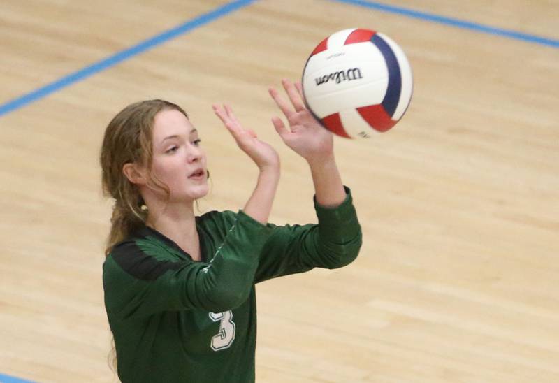 St. Bede's Ayla Yeske returns a serve from Marquette on Thursday, Sept. 4, 2025 at Bader Gym.