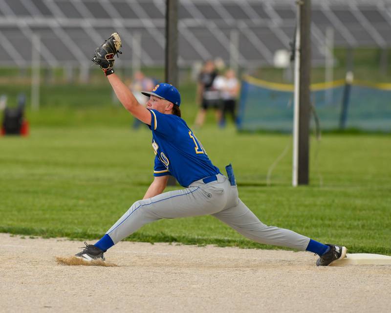 Somonauk's Kaden Geers-Clason (10) stretches out for the ball while keeping his foot on the bag for an out during the game on Tuesday May 13, 2025, while taking on Newark High School.
