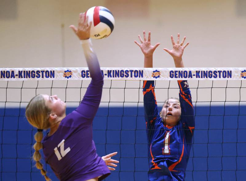 Rochelle's Jillian Bruns tries to spike the ball by Genoa-Kingston's Presley Meyer Monday, Sept. 15, 2025, at Genoa-Kingston High School.
