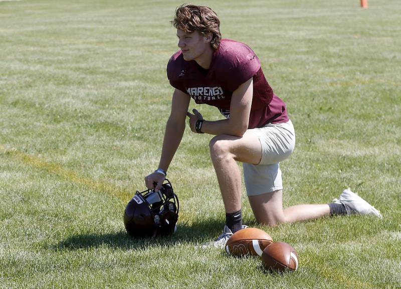 Marengo’s Josh Holst takes a break during summer football practice Monday, June 27, 2022, at Marengo Community High School in Marengo.