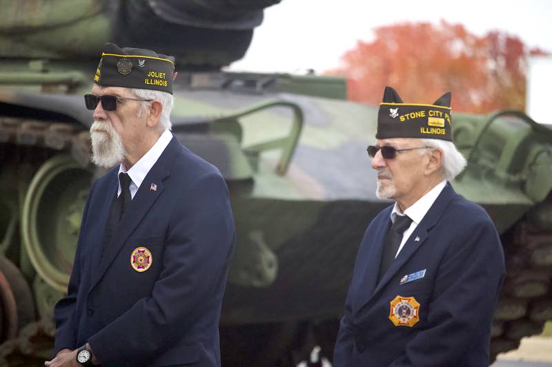 Stone City VFW Post 2199 members Mike Scovel (left) and Edward Chartrand, stand for a flag ceremony at the VFW Post at 124 Stone City Drive, Joliet, on Tuesday, Nov. 11, 2025.