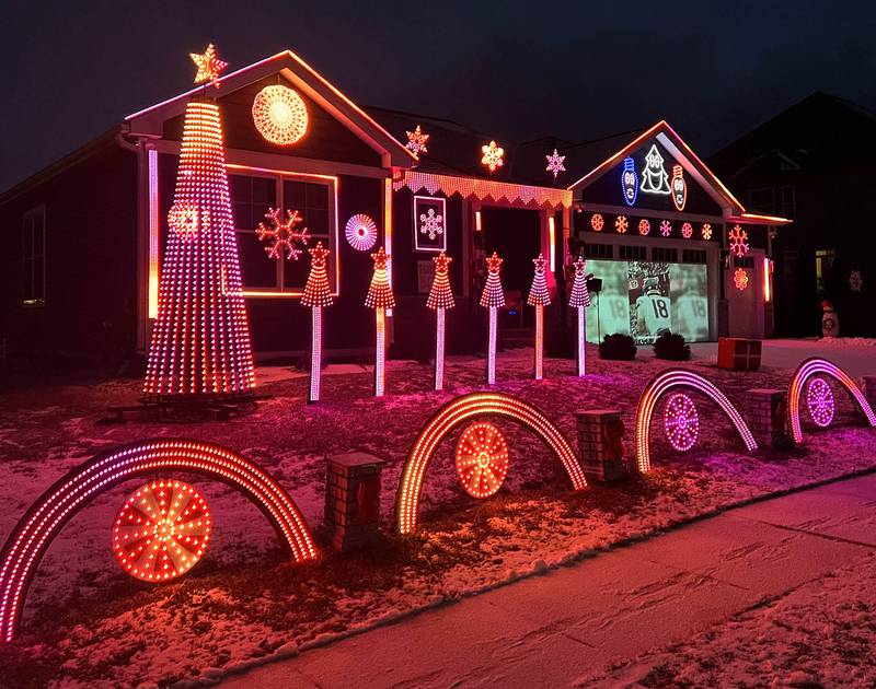 A Chicago Bears light show put together by Tim Caravia and his family plays Friday, Jan. 16, 2025, at his home on Dustin Drive in Sycamore. The show will run from 5:30 to 9:00 p.m. most days until the Bears season ends.