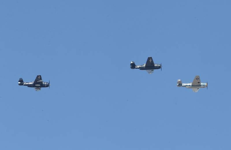 A TBM aircrafts fly over during the 10th annual TBM Reunion and Airshow on Saturday, May 17, 2025 at the Illinois Valley Regional Airport in Peru.