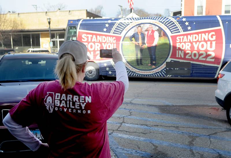 Lisa Peck records the arrival of the Darren Bailey, a Republican candidate for governor, Thursday at the Little Chef Restaurant in McHenry. Bailey, who is one of several Republicans expected in the field this year, spoke to a room full of people during the first of four scheduled campaign stops Thursday.