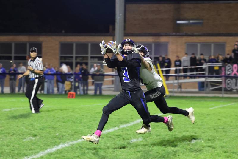 Peotone's Nick Cronin catches a pass before running for a touchdown during the Blue Devils' 25-20 loss to Manteno on Friday, Oct. 17, 2025, in the annual Rumble on Route 50 rivalry game.