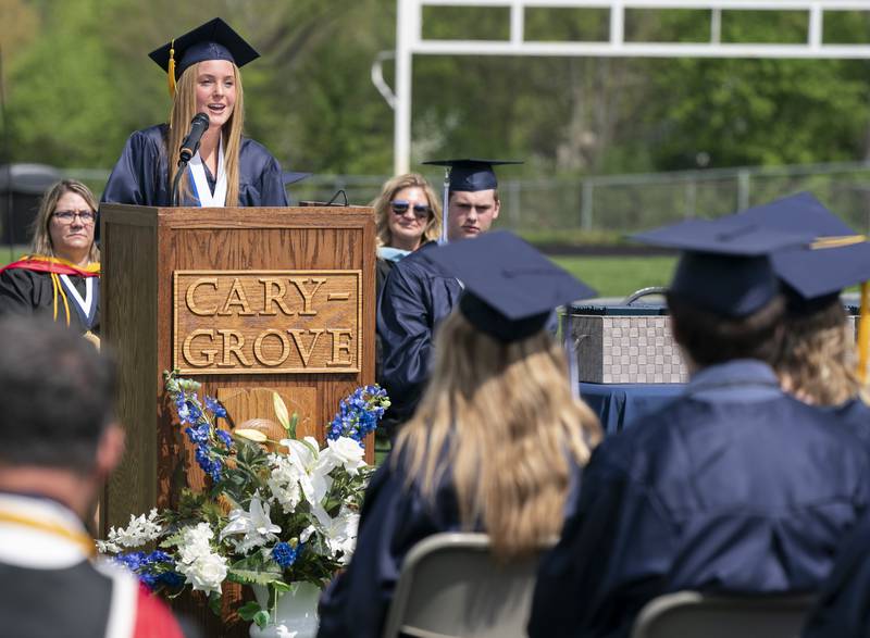 Graduating senior Madelyn Dolezal gives a speech to classmates during a graduation ceremony for the class of 2022 on Saturday, May 14, 2022, at Cary-Grove High School in Cary.
