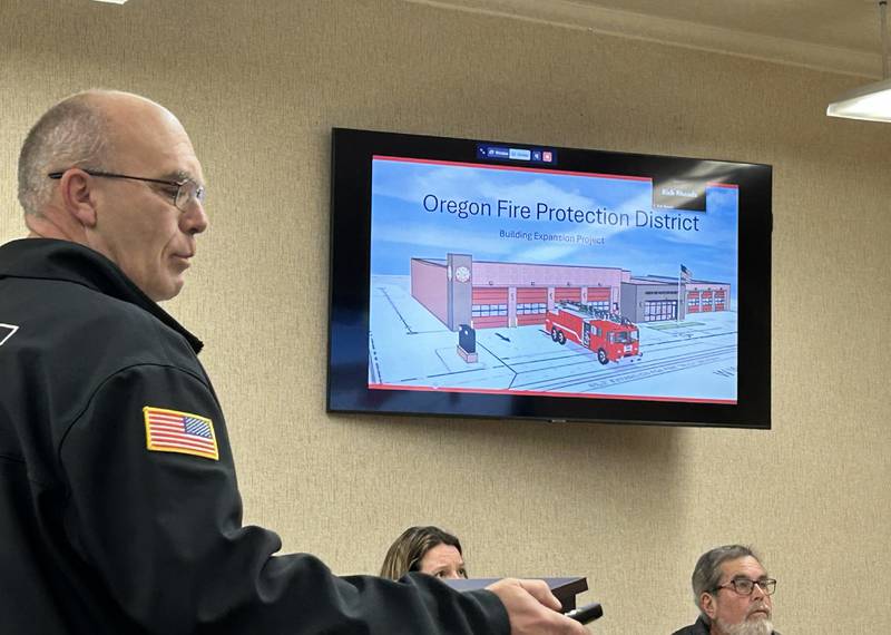 Oregon Fire Chief Michael Knoup presents the fire district's request to the Oregon Planning Commission for a variance to expand the fire station during a Tuesday, Jan. 21, 2025 meeting. The fire district needs a variance to add on to the station because the station is located in the city's river front commercial district.