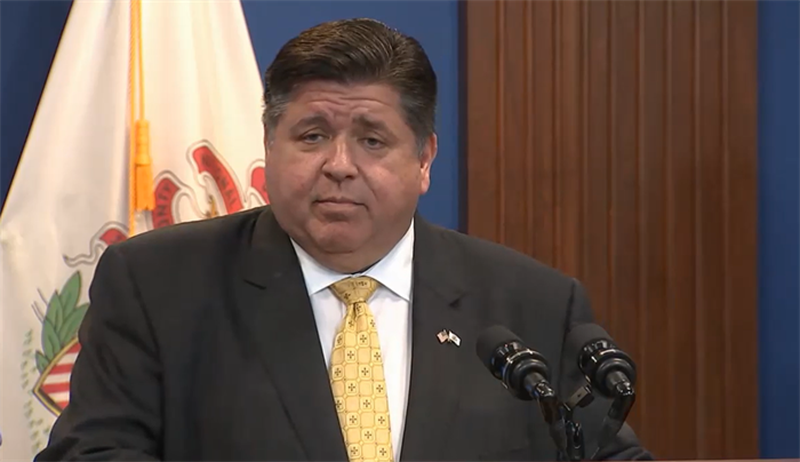 Gov. JB Pritzker takes questions at a news conference Wednesday in Chicago in which he gave an update on more than 500 migrants that have been bused to the city by the state of Texas in the past two weeks.