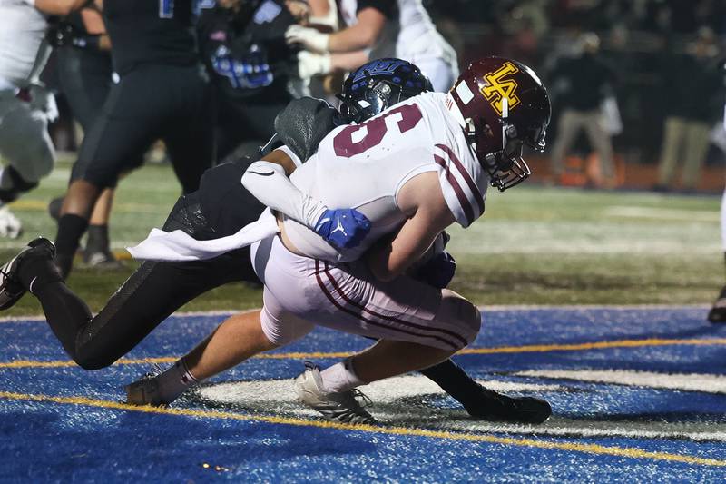 Loyola’s Gavin Vradenburg scores on a pass against Lincoln-Way East in the Class 8A semifinal on Saturday, Nov. 23, 2024 in Frankfort.