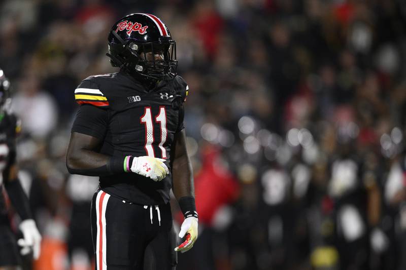 Maryland linebacker Ruben Hyppolite II (11) in action during the first half of an NCAA college football game against Virginia, Friday, Sept. 15, 2023, in College Park, Md. (AP Photo/Nick Wass)