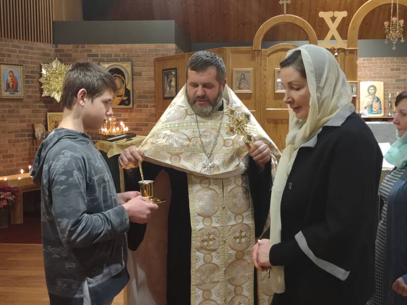 Father Vladimir Kovalchuk, center, of St. Nicholas of Myra Russian Orthodox Church in McHenry was born in Ternopil and said prayers for peace in Ukraine during services on Thursday, Feb. 24, 2022.