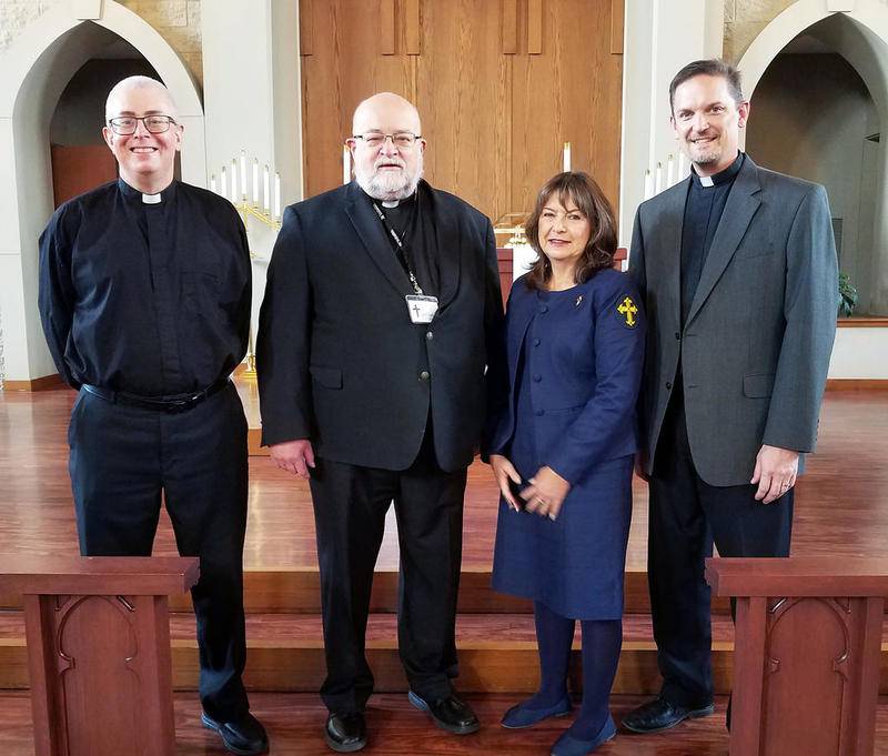 The Rev. Patrick Pinion (from left), circuit director, installed the Rev. Timothy Frick as assisting pastor and Carol Brown as deaconess at  Evangelical Lutheran Church of St. John (Missouri Synod) in Sycamore during a service on Nov. 1. They will carry out their duties as they work with the Rev. Paul Mumme, senior pastor, in bringing Christ to the community. St. John is located at 26555 Brickville Road.