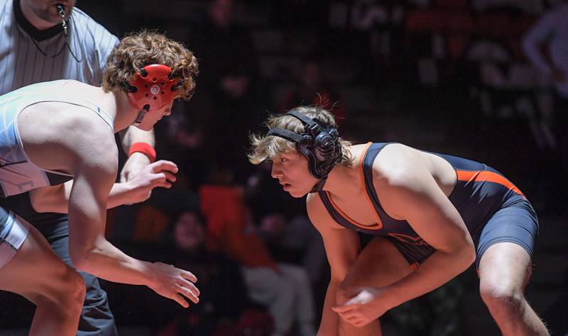 Marian Central's Dan French and St. Charles East's Cooper Murray wrestle at 190 pounds during a match in St. Charles on Wednesday, December 20, 2023.