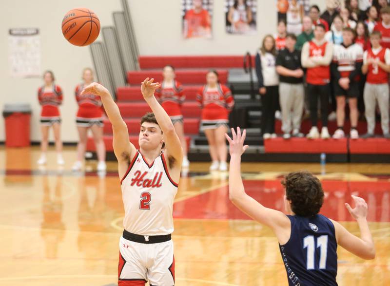 Hall's Gianni Guerini shoots a jump shot over Bureau Valley's Logan Philhower on Tuesday, Feb. 6, 2024 at Hall High School.