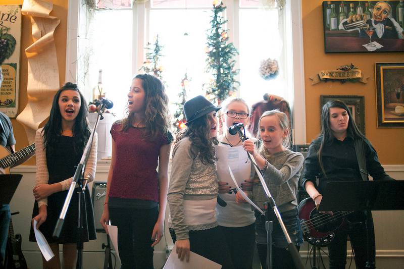 Emma Chiaro (Lockport), Arianna Gonzalez (Oak Lawn), Xenia Sinclair (Homer Glen), Olivia Minogue (Lockport), Grace Koliopoulos (Plainfield) and Dakota Carl on bass (Joliet) perform a cover of "We're Not Gonna Take It" by Twisted Sister.