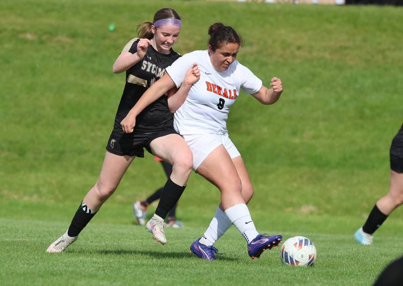 DeKalb's Alexia Ortiz takes a shot as Sycamore's Ellie Lawless applies pressure Thursday, May 7, 2026, during their game at Sycamore High School.